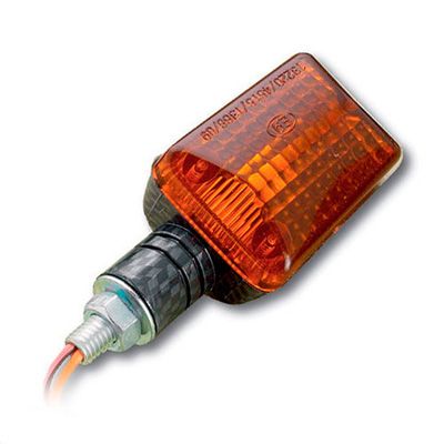 Short stem mini indicator featuring a carbon body, smoked lens, and an orange light, designed for bicycles with a sleek and durable appearance.