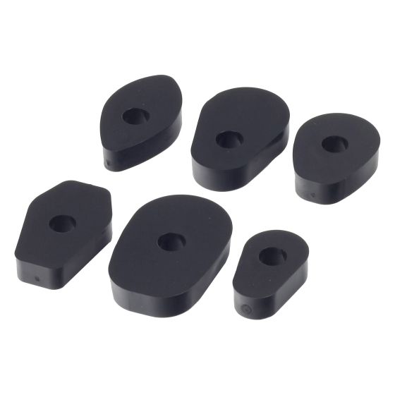 Black plastic riser kit for Yamaha motorcycles, featuring six pieces in various sizes and shapes, designed to elevate fairing indicators for improved visibility.