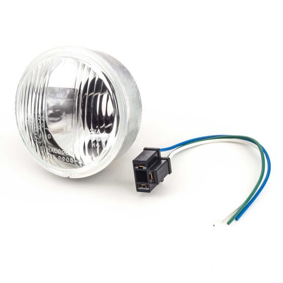 Replacement inner unit for Dominator headlight, featuring a round clear glass lens, silver metal housing, and a three-wire connector with blue and green wires.