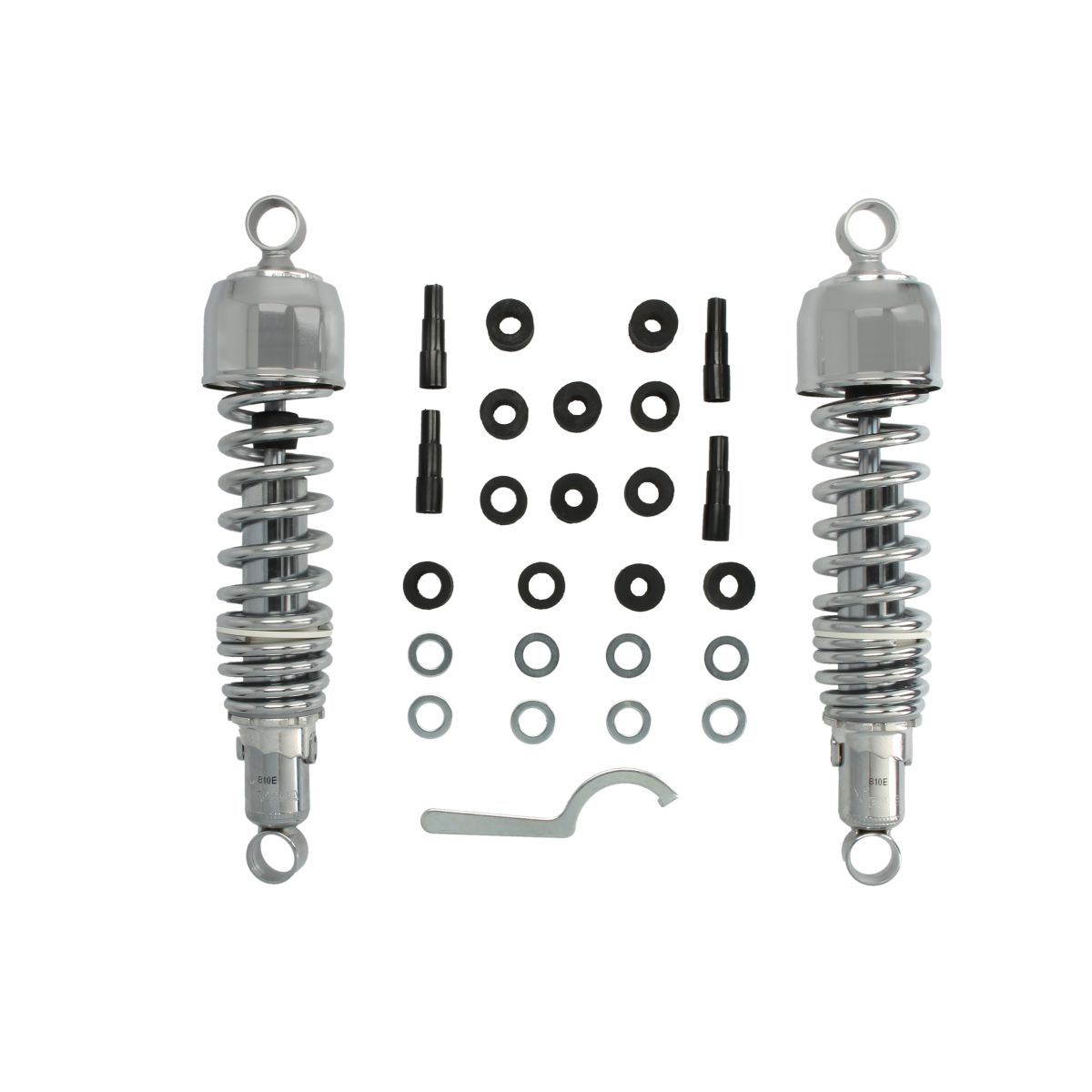 Chrome twin shock absorbers with a 325 mm eye-to-eye measurement, featuring coiled springs, mounting hardware, and a tool for installation, all arranged neatly.
