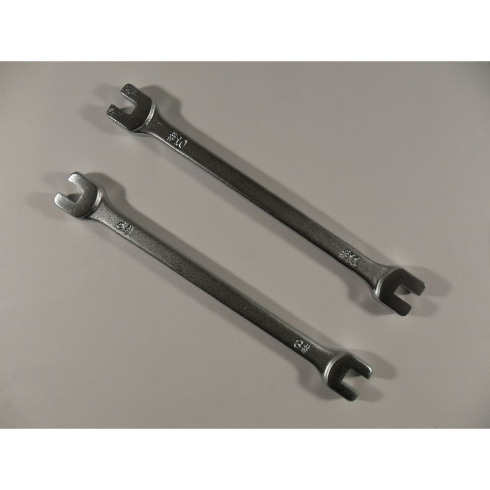 Two metal spoke wrenches from the Bike-It Universal Motorcycle Wheel Spoke Wrench Set, labeled for 8, 9, 10, and 11 gauge, featuring a shiny silver finish and open-ended design.