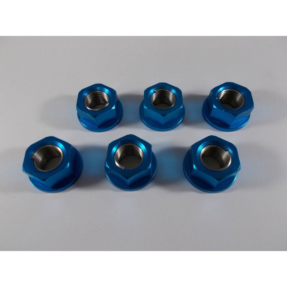 Six blue alloy sprocket cush drive nuts, M10/M12x1.25, featuring a hexagonal shape and threaded interior, arranged in two rows on a white background.