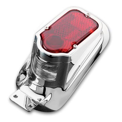 Chrome rear/brake light with a rectangular red lens, featuring a textured surface and a mounting bracket for number plate illumination.
