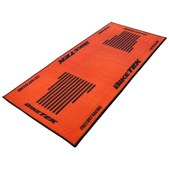 Bright orange garage mat with black edges, featuring a striped design and "BIKETEK" branding, measuring 190 x 80 cm, designed for bike maintenance and protection.