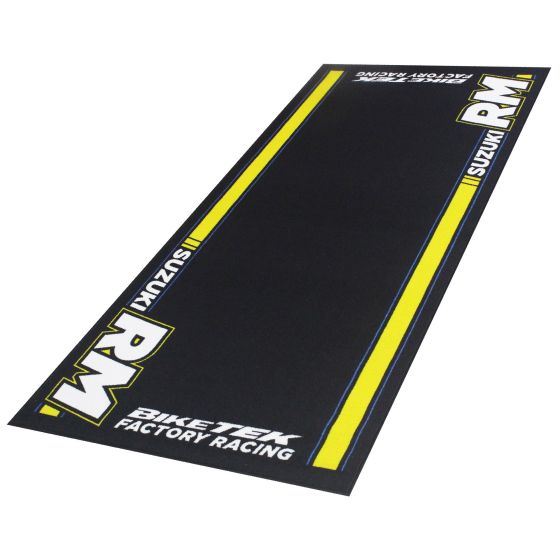 Black garage mat featuring yellow and white Suzuki RM branding, measuring 190 x 80 cm, designed for motorcycle maintenance with a durable, non-slip surface.