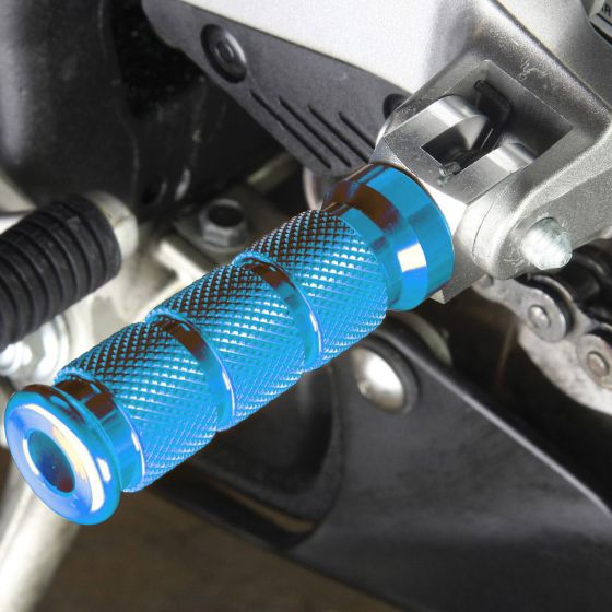 Replacement alloy front footpeg in vibrant blue with a textured grip, designed for Honda motorcycles, showcasing a sleek, durable finish and precise engineering.