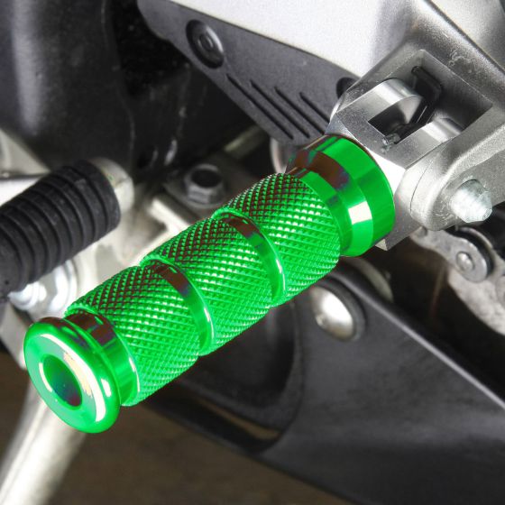 Green alloy round sports front footpeg with a textured grip and silver accents, designed for Honda motorcycles, showcasing a durable and stylish finish.