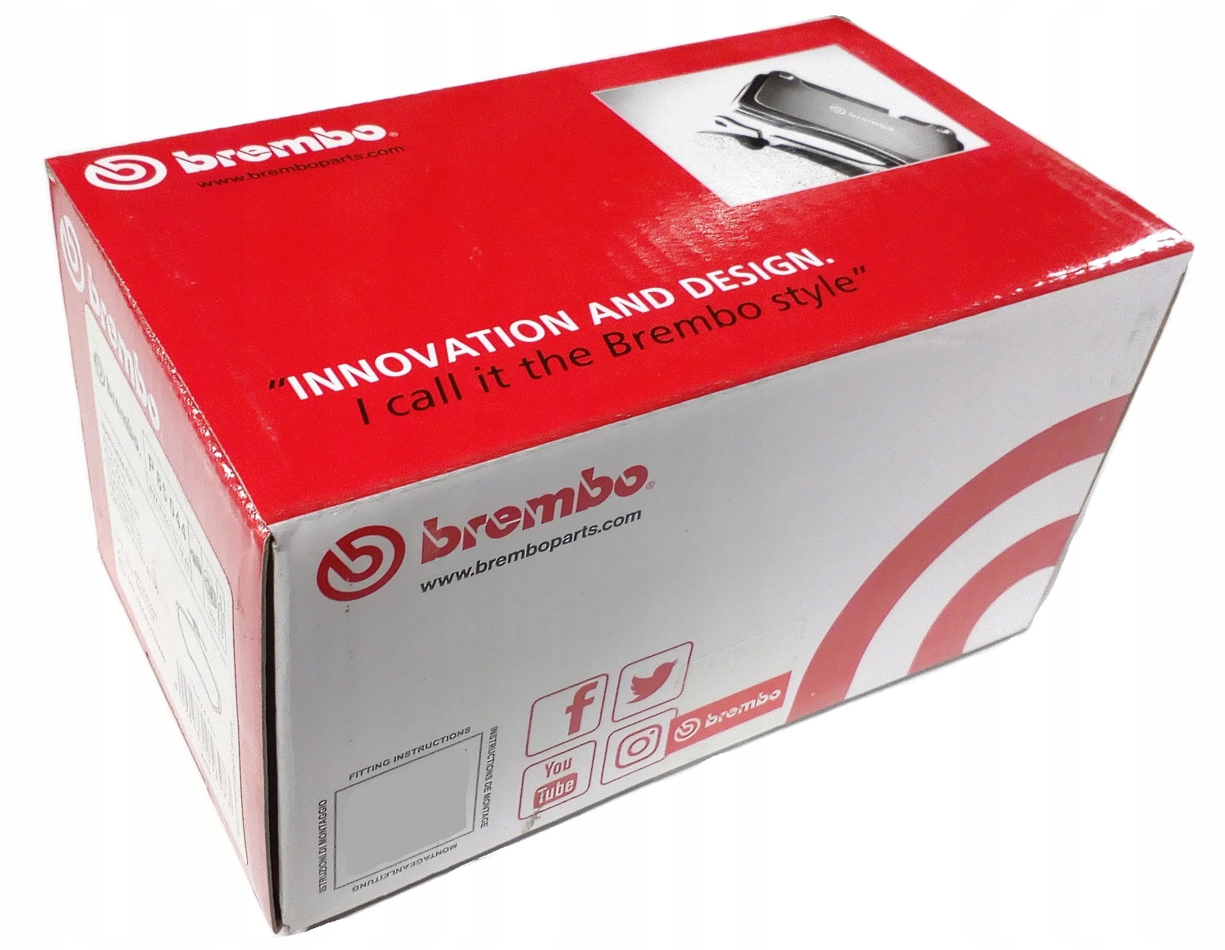 Red and white box labeled "BREMBO" with the text "INNOVATION AND DESIGN" and "I call it the Brembo style," featuring social media icons and product details.
