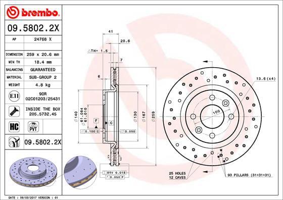 Perforated and vented high-carbon brake disc in metallic gray, featuring a circular design with multiple holes, accompanied by bolts and screws, labeled with technical specifications.