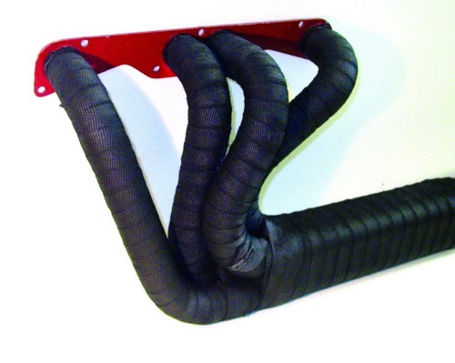 Black graphite exhaust insulating wrap, 2 inches wide and 100 feet long, tightly coiled around exhaust pipes, featuring a textured surface for heat resistance.