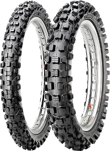 CST CM734 57M Bite Rear Tyre features a rugged black rubber design with deep, aggressive tread patterns, sized 100/90-19, ideal for off-road performance.