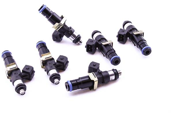 Six black fuel injectors with blue accents and metal clips, designed for Buick, Ford, GMC, and Mercury vehicles, showcasing a compact and durable construction.