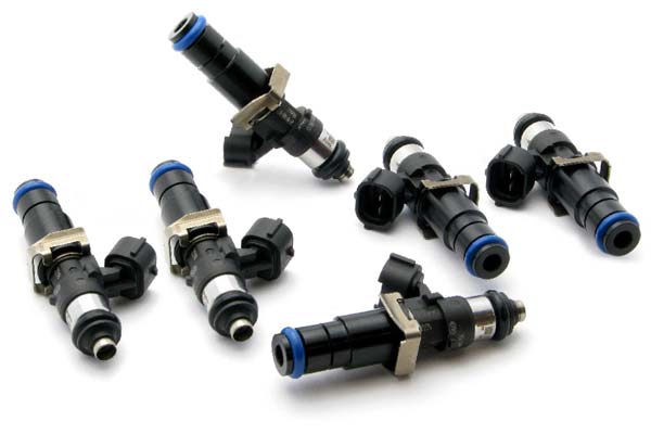 Six black fuel injectors with blue and silver accents, featuring a metal bracket and electrical connectors, designed for Buick, Ford, GMC, and Mercury vehicles.