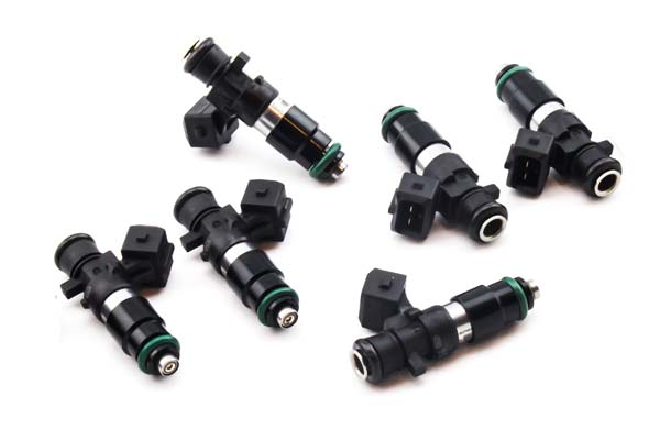 Six black Bosch EV14 fuel injectors with green O-rings and plastic connectors, designed for DeatschWerks 01-05 Porsche 911/996 H6 engines, arranged in two rows.