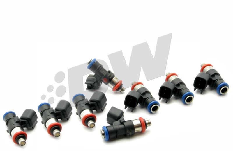Set of eight 950cc fuel injectors in black plastic with red and blue O-rings, featuring a sleek design and a metallic nozzle for high-performance applications.