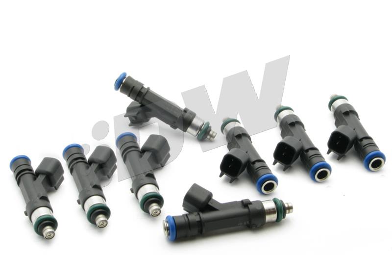 Eight black fuel injectors with blue and silver accents, featuring a cylindrical shape and electrical connectors, arranged in a group on a white background.