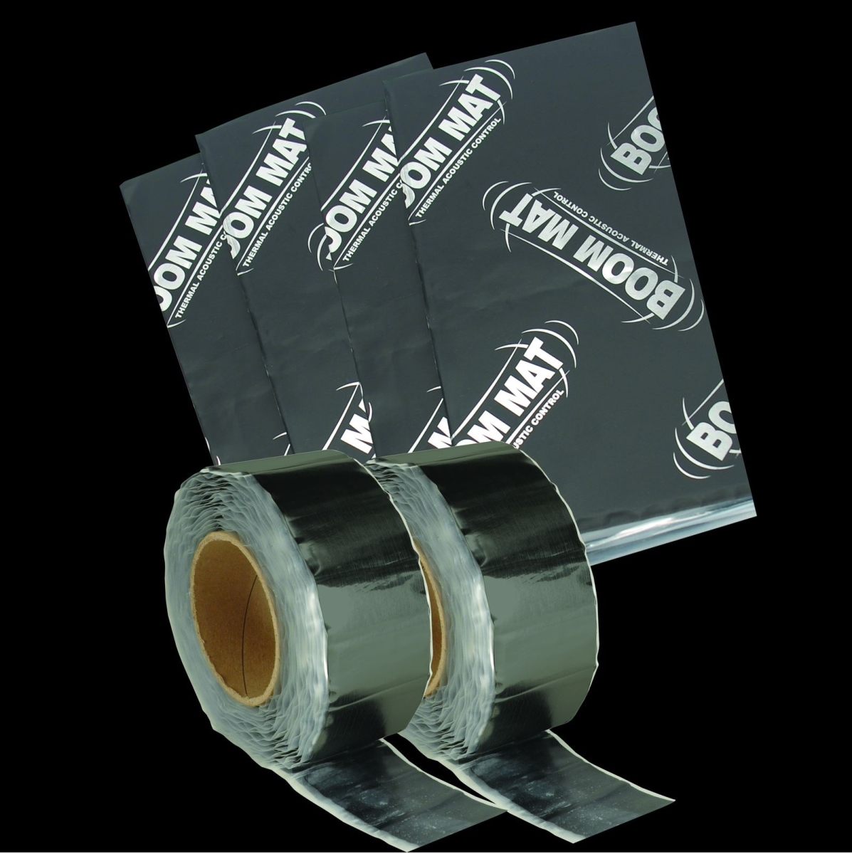 Black sound dampening material rolls and sheets, featuring "BOOM MAT" branding, designed for automotive noise reduction, with a shiny, metallic finish.