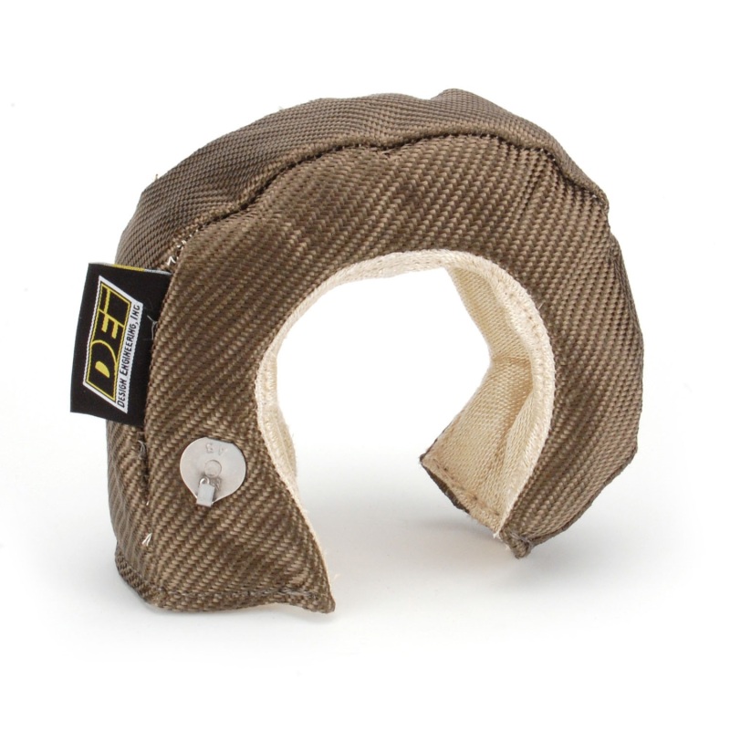Brown titanium turbo blanket with a textured exterior, featuring a cream-colored inner lining and a metal snap closure, designed for custom fit on turbochargers.