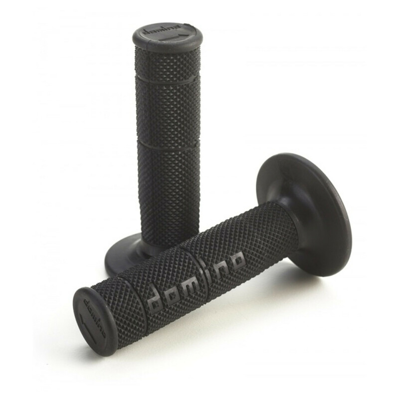 Black rubber cross enduro grips by Domino, featuring a textured surface for enhanced grip and no waffle pattern, designed for durability and comfort in off-road riding.
