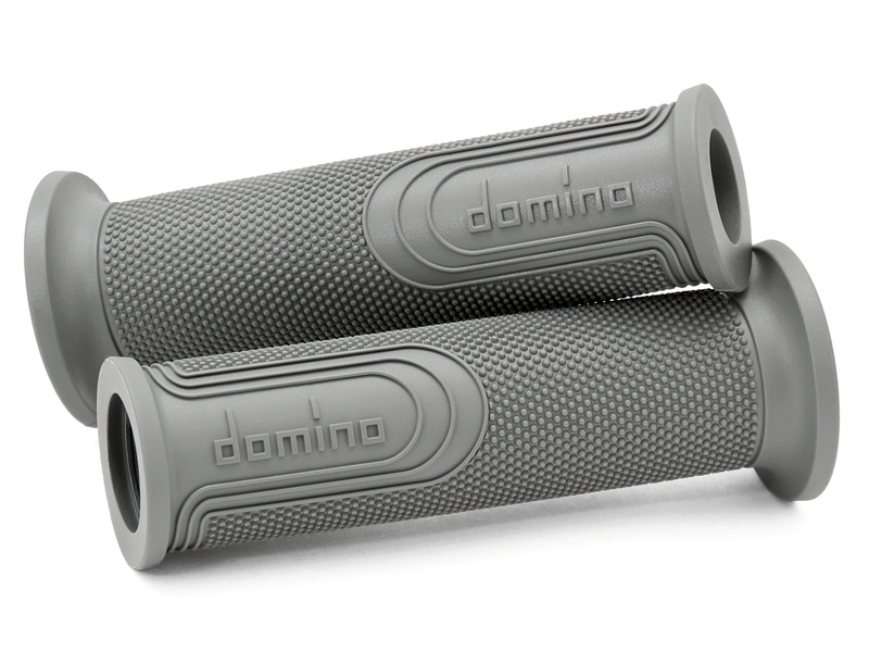 Gray rubber grips with a full diamond texture and raised "domino" logo, designed for enhanced grip and comfort.