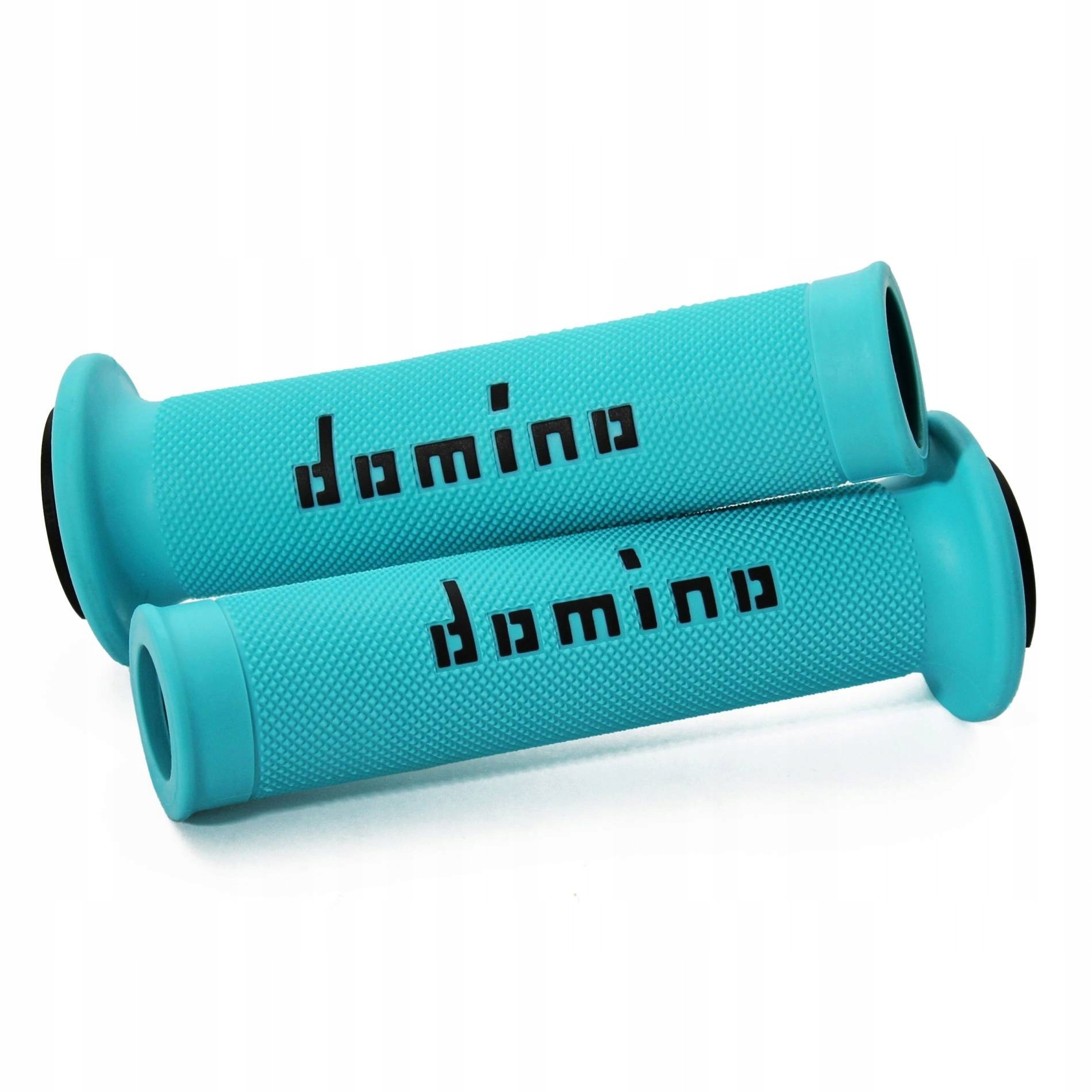 Turquoise soft rubber grips with textured surface and black "domino" logo, designed for enhanced grip and comfort on handlebars.