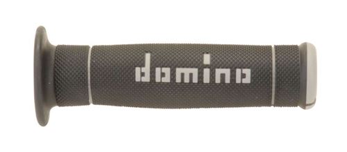 Black rubber grip with a full diamond texture, featuring the "domino" logo in white and silver accents on each end for enhanced grip and control.