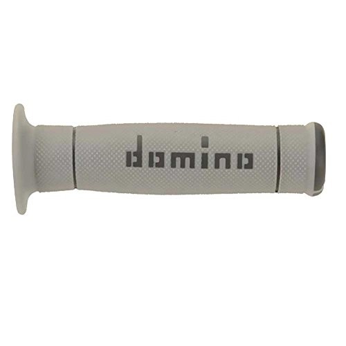 Gray rubber grips with a full diamond texture and "domino" branding, designed for enhanced grip and comfort on handlebars.