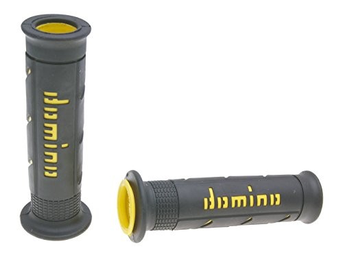 Black rubber grips with yellow "Domino" branding, featuring a smooth surface and dual compound material for enhanced comfort and grip, designed for road racing.