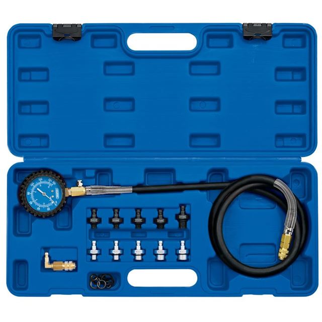 Draper 35879 Oil Pressure Test Kit in a blue plastic case, featuring a pressure gauge, flexible hose, and 11 metal adapters for various applications.