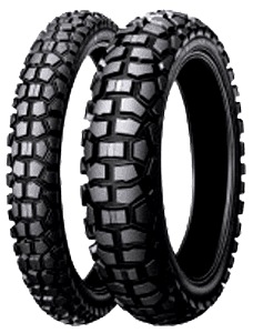 Two black Dunlop D605 motorcycle tires featuring a rugged tread pattern designed for off-road performance and durability.