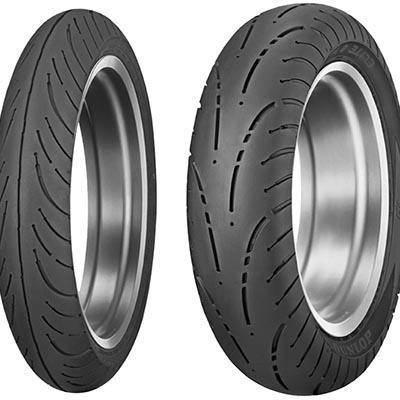 Dunlop Elite 4 rear motorcycle tyre in blackwall design, size 150/80R17, featuring a smooth tread pattern and a silver metal rim.