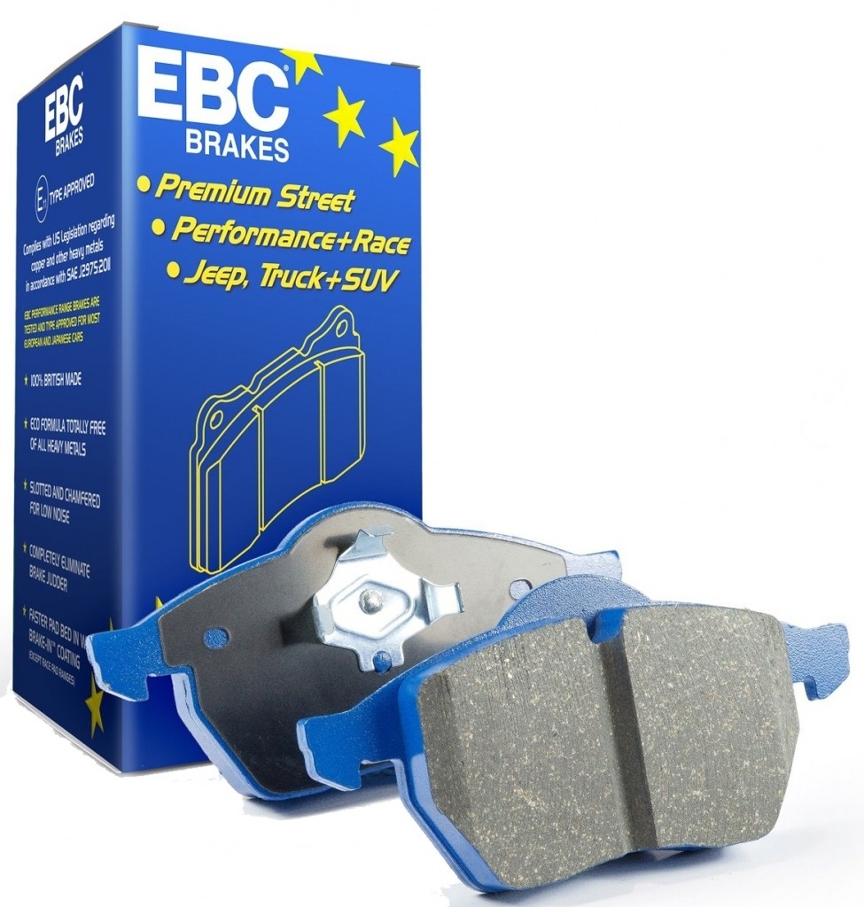 EBC Brakes Bluestuff brake pad set in blue with a metallic backing, featuring a textured friction surface, displayed alongside a blue and yellow box labeled "EBC Brakes."