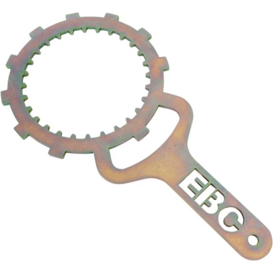 Metal clutch removal tool with a circular, notched edge and a sturdy handle, featuring the "EBC" logo cut out in the handle, showcasing a bronze finish.