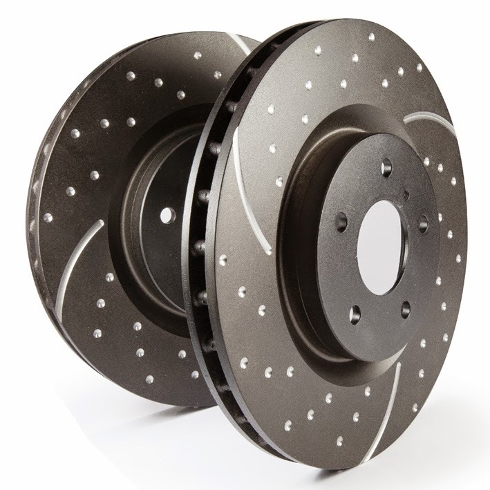 Two solid, metallic brake discs with a diameter of 232mm and thickness of 10mm, featuring drilled grooves for enhanced performance and heat dissipation.
