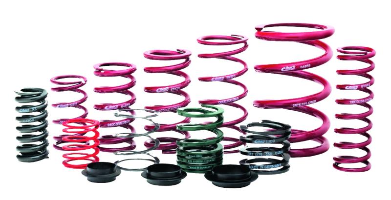 Eibach Competition Springs in various sizes, featuring a vibrant pink finish, designed with a 2.25" internal diameter, 5.0" length, and a 1400 lbs/in rate, showcasing high-performance materials.