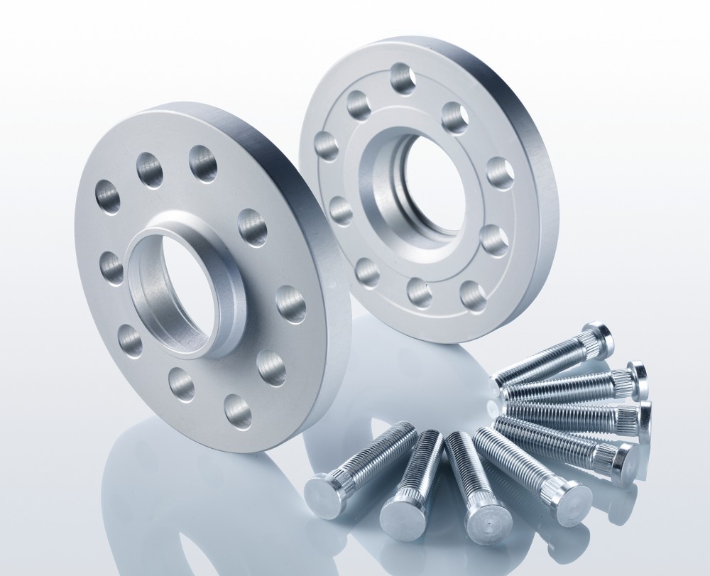 Two silver aluminum wheel spacers with multiple holes and a smooth finish, accompanied by several silver bolts, designed for BMW vehicles.
