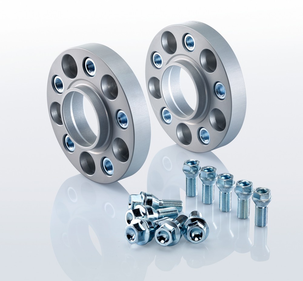 Silver aluminum track widening spacers with five holes, 20mm thickness each, accompanied by a set of chrome-plated bolts and nuts for installation.