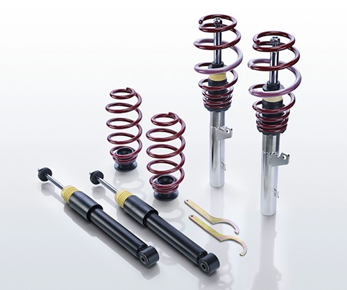 Eibach Pro-Street-S suspension kit featuring red coil springs, silver shock absorbers, and black components, designed for enhanced vehicle performance and handling.