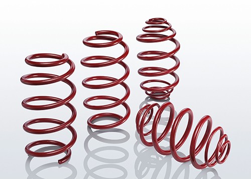 Red coil springs from the EIBACH E20-65-013-02-22 Suspension Kit, featuring a smooth finish and varying heights, designed for enhanced vehicle performance.