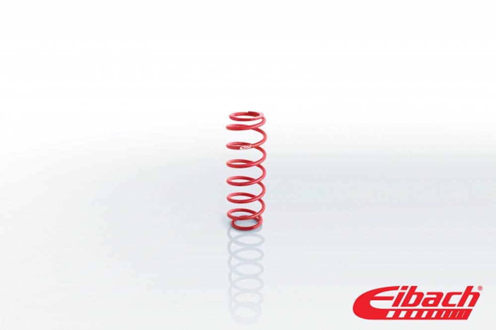 Red coil spring with a sleek design, featuring tightly wound coils, labeled with "Eibach" logo, designed for extreme travel with a stiffness rating of 475 lbs/in.