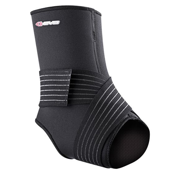 Large grey ankle stabilizer made of neoprene material, featuring a supportive strap and an open heel design for enhanced mobility and comfort.