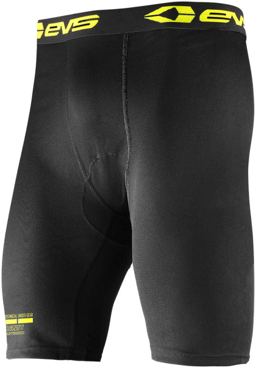 Black base layer shorts for men by EVS, featuring a snug fit, vented material for breathability, and a bright yellow logo waistband.