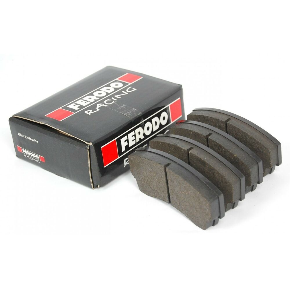 Black brake pad set with a textured surface, featuring four pads and a branded box displaying "FERODO RACING" in red and white, designed for high-performance use.