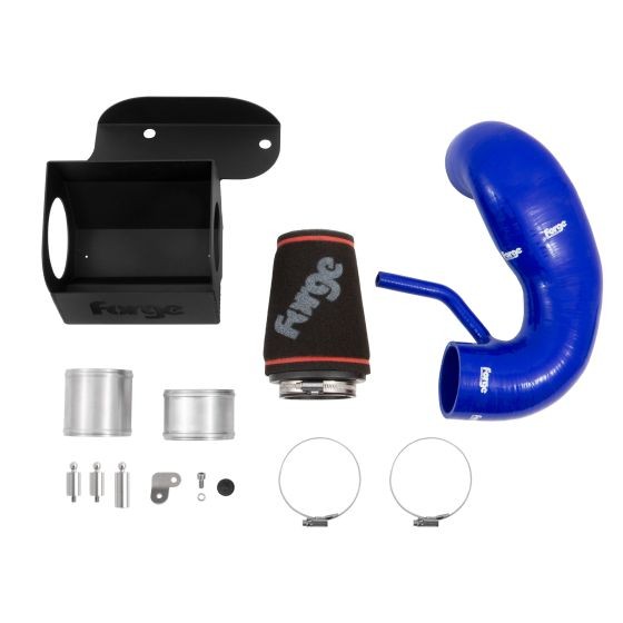 Black metal shield with a textured finish, blue silicone hoses, a black air filter with red trim, and various metal fittings and clamps.