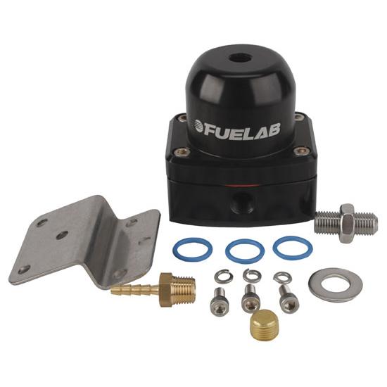 Black aluminum fuel pressure regulator with a rounded top, featuring the Fuelab logo, accompanied by metal mounting bracket, fittings, and various washers and O-rings.