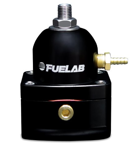 Black aluminum fuel pressure regulator with a shiny top, featuring a threaded inlet, a brass outlet fitting, and the "FUELAB" logo prominently displayed on the front.