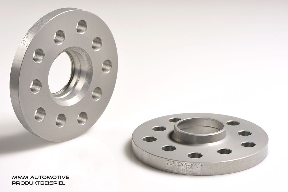 Silver aluminum wheel spacers with a smooth finish, featuring five holes and a central hub, designed for track widening of 36mm per axle.