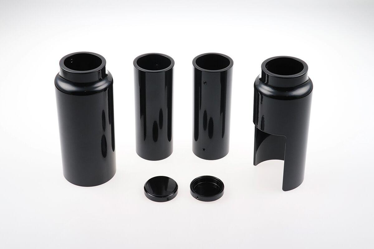 Black HD-BRO103 Cult Werk fork covers for Harley Davidson FXBB 1750 (2018-2020), featuring sleek design with two cylindrical pieces and a cut-out section for easy installation.
