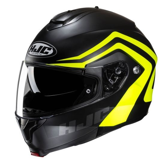 Black flip-up motorcycle helmet with bright yellow accents, clear visor, and ventilation ports, featuring the HJC logo prominently displayed on the front and side.