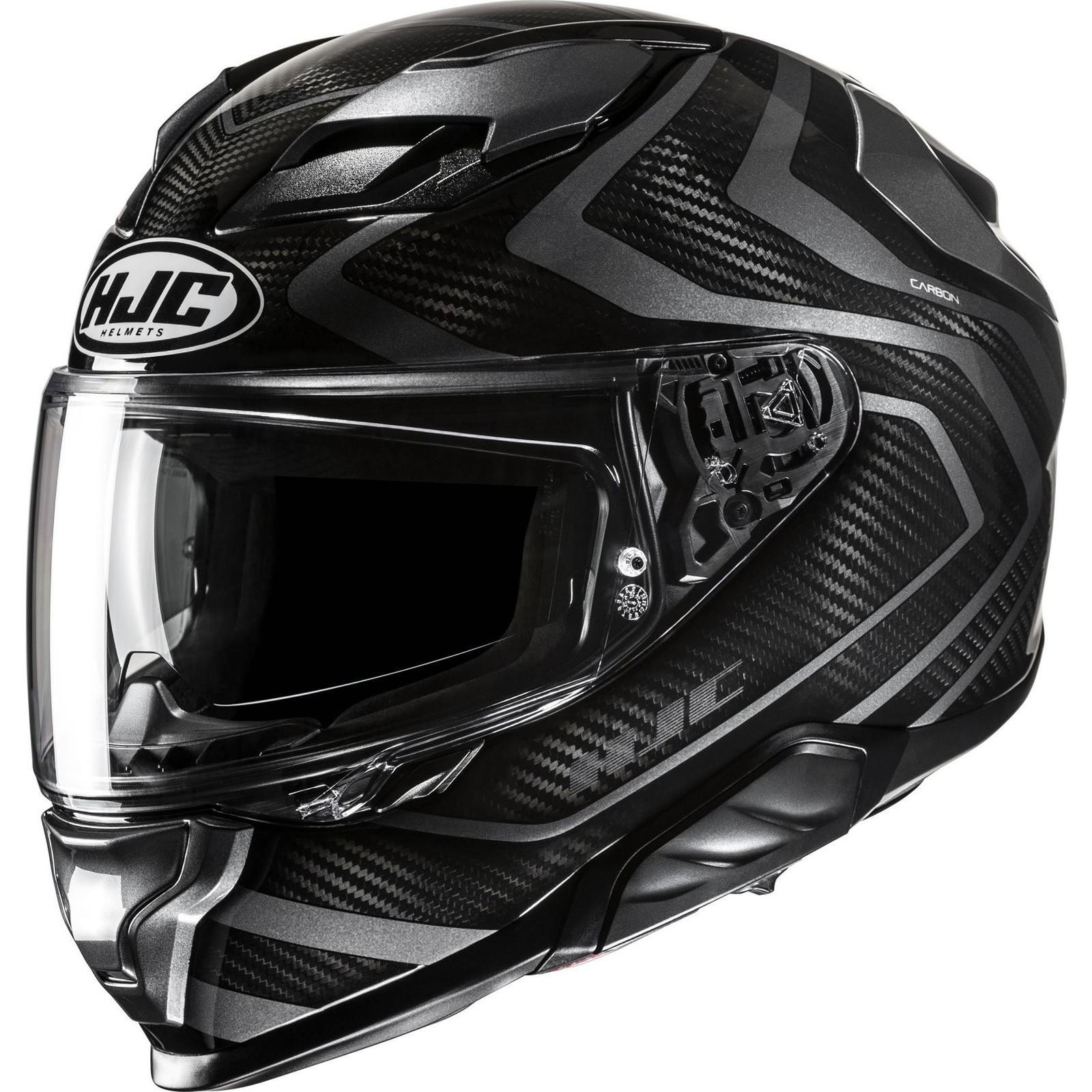 HJC F71 Carbon Nevio Motorcycle Helmet in sleek black with a carbon fiber finish, featuring a clear visor, aerodynamic design, and ventilation ports for enhanced airflow.